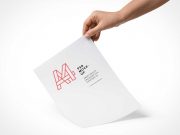 A4 Paper Hand Held PSD Mockup