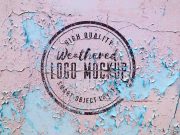 Weathered Logo On Chipping Paint Surface PSD Mockup