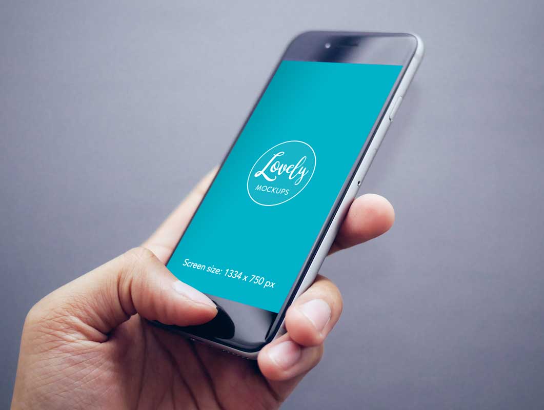Hand-held iPhone Closeup In Use PSD Mockup
