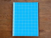 Photorealistic Grid Sketchbook PSD Mockup