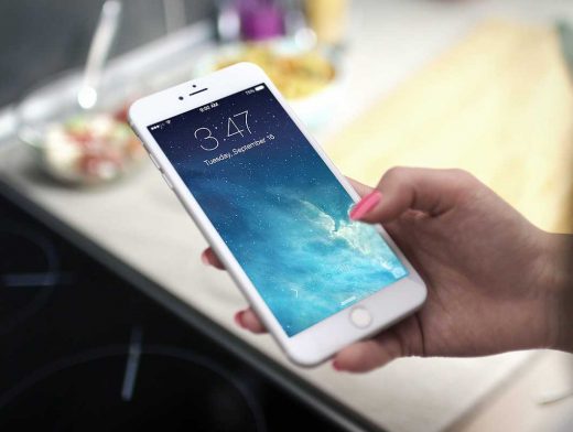 iPhone 6 In Hand Being Used PSD Mockup