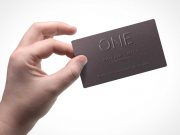 Corporate Business Card Front In Hand PSD Mockup
