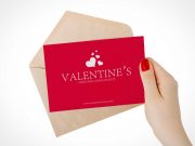 Woman Presenting Valentines Day Card PSD Mockup
