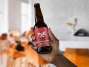Handheld Glass Beer Bottle PSD Mockup